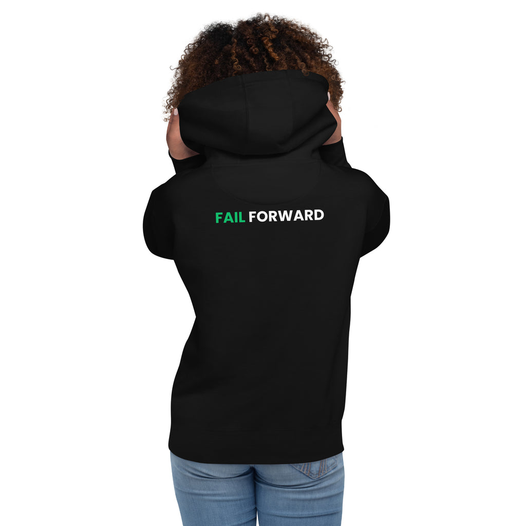 Back view of female model wearing the black Failscool hoodie. Minimalist, high-quality garment celebrating authenticity and self-growth.
