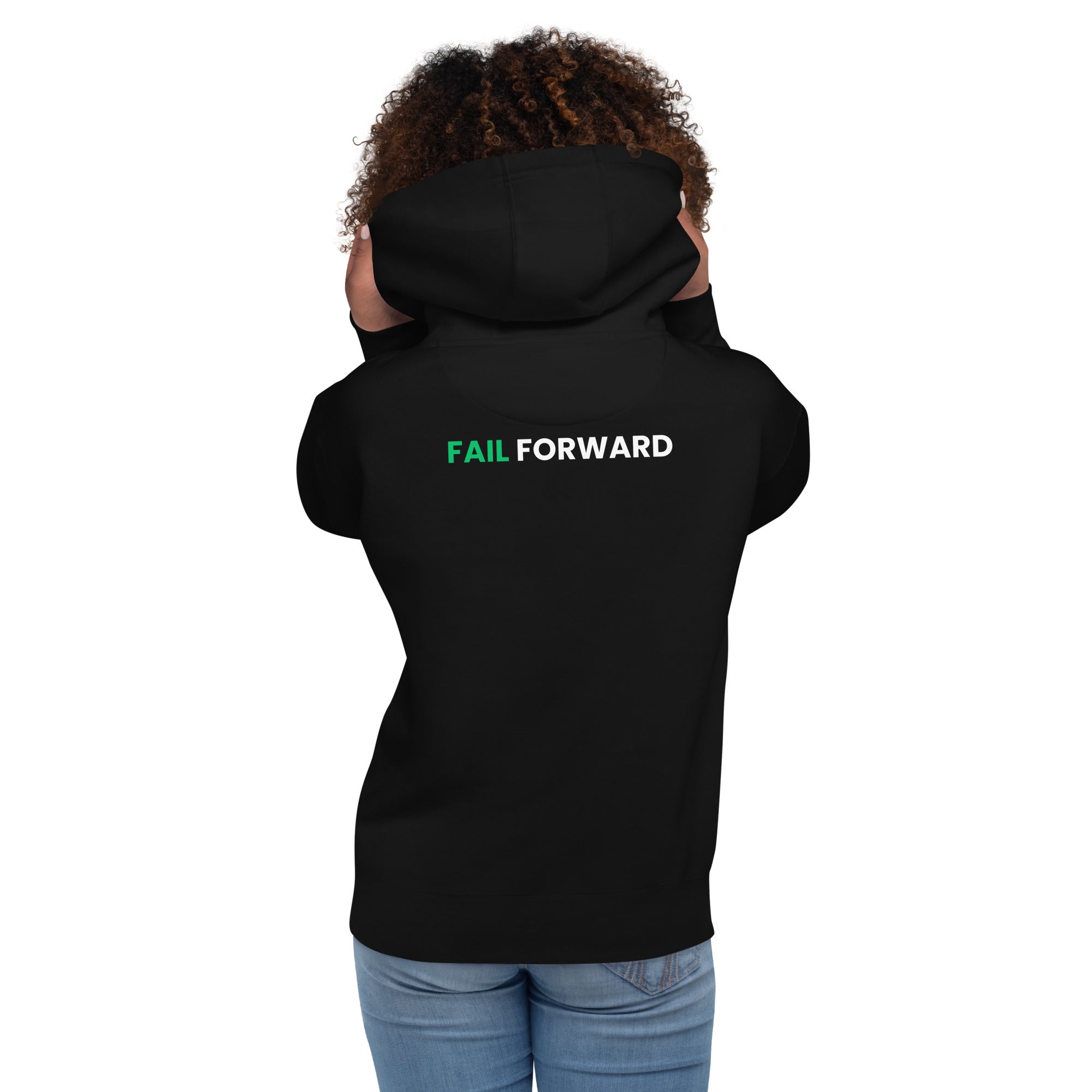 Back view of female model wearing the black Failscool hoodie. Minimalist, high-quality garment celebrating authenticity and self-growth.