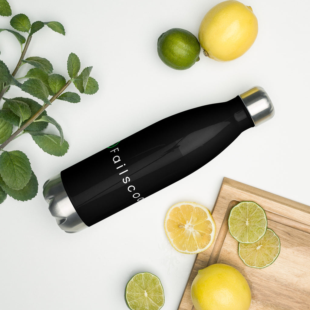 Failscool stainless steel bottle surrounded by fresh lemons. Sleek matte black finish and white logo symbolizing energy, freshness, and mindful living.