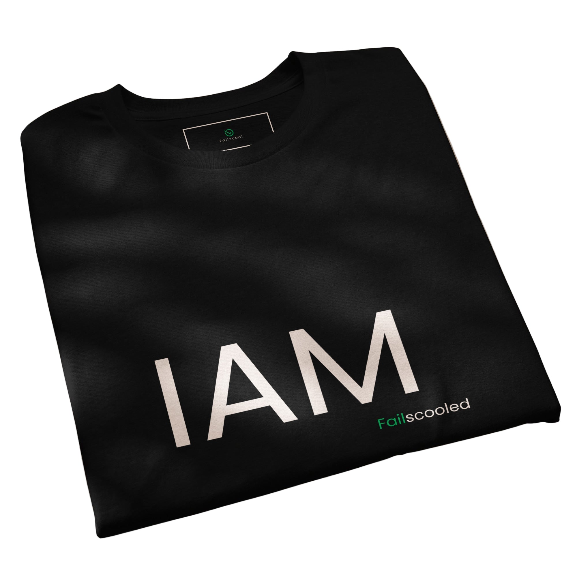 Folded black Failscool t-shirt featuring the white print “I AM FAILSCOOLED.” Simple and authentic eco design made to inspire growth.