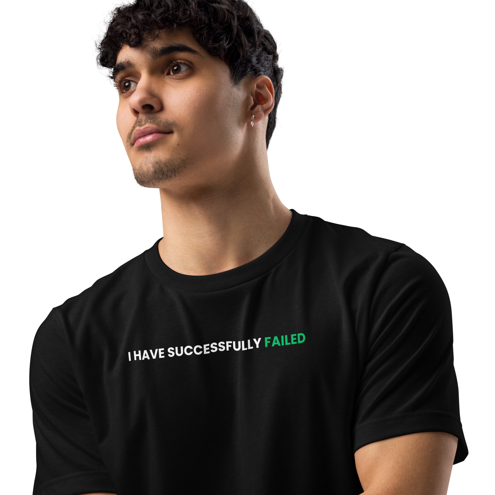 Male model wearing black Failscool t-shirt with the white text “I HAVE SUCCESSFULLY FAILED.” Confident and simple streetwear look.